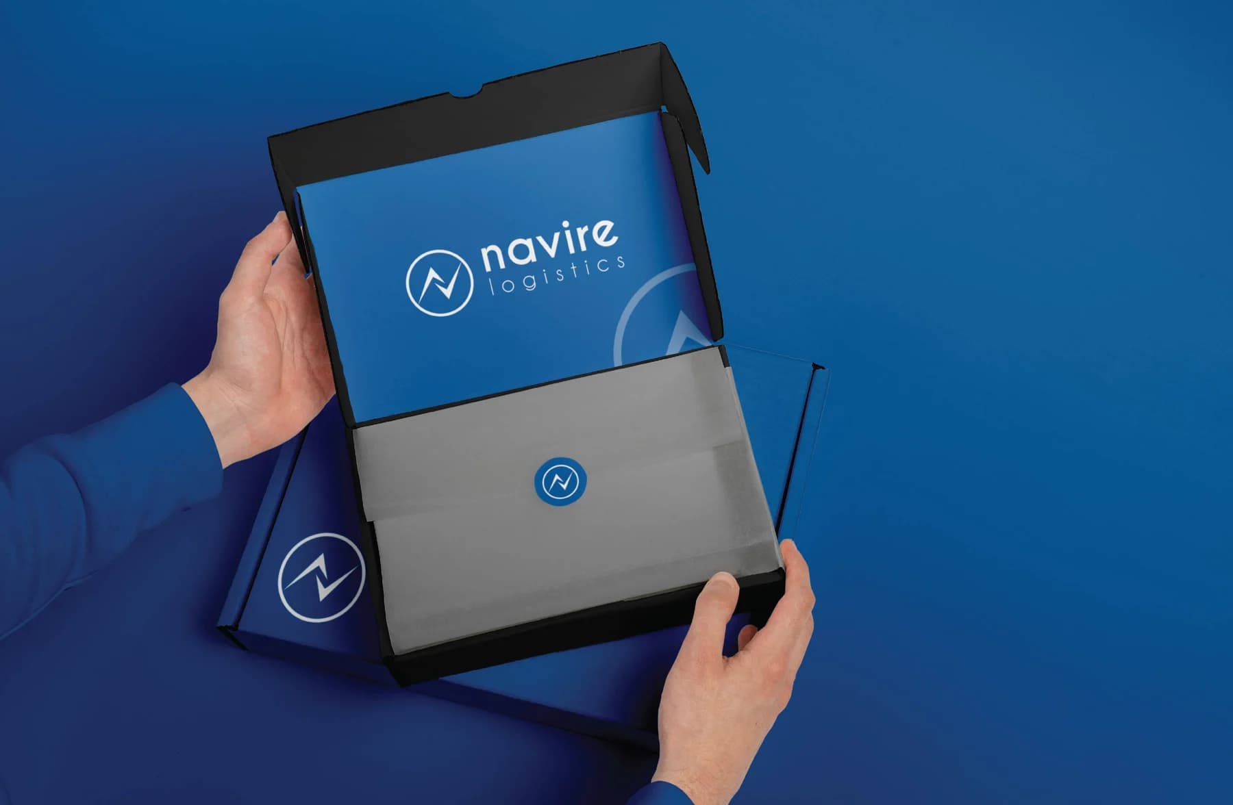 Navire Logistics — Identity system for a logistics operator, applied across document folders, stationery and corporate collateral.