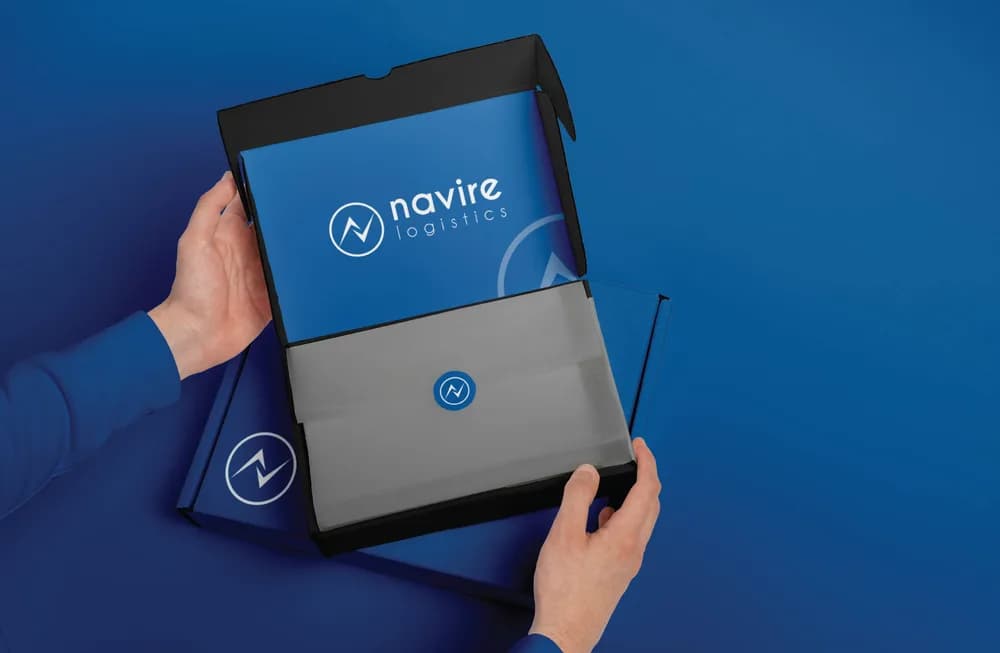 Navire Logistics — Identity system for a logistics operator, applied across document folders, stationery and corporate collateral.