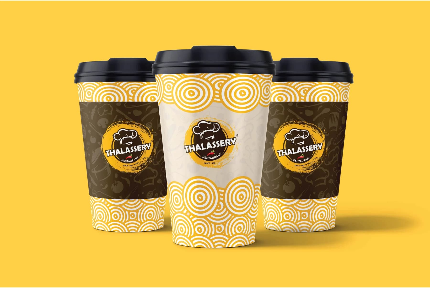 Thalassery — Brand identity and takeaway cup design for a Thalassery coffee house, built on a repeating spiral motif.