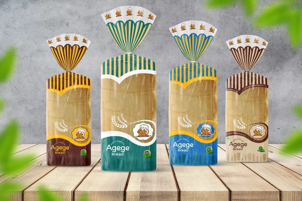 Agege Bread — Bread bag packaging with a colour-coded crown device separating variants across the range.