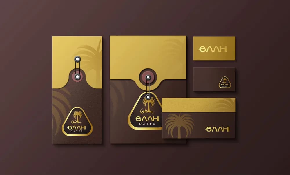 Baahi Dates — Gold-on-brown identity and stationery suite for a premium dates brand.