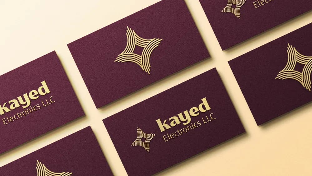 Kayed Electronics — Gold-foil identity and business card system for an electronics trading company.